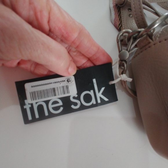 The Sak Cora Crossbody Bag in Blush Pink with Striped Strap - Picture 2 of 16